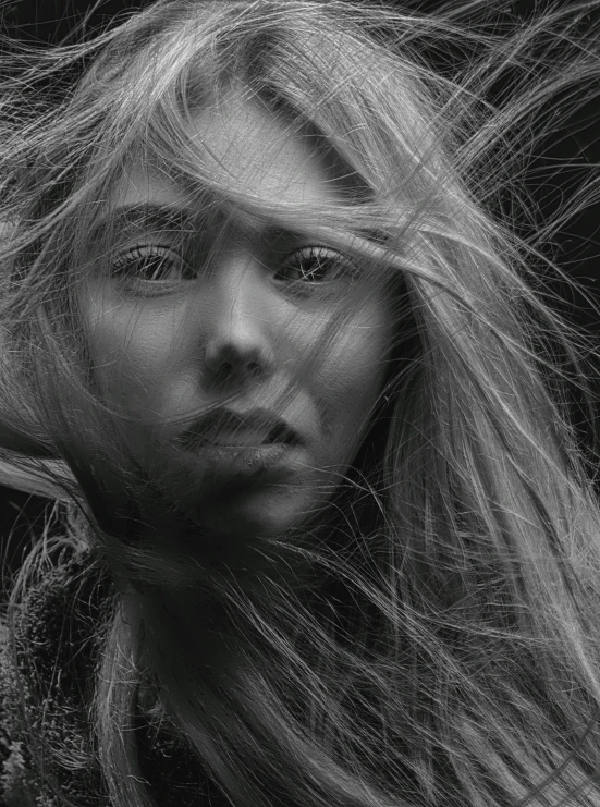a black and white photo of a woman with long hair, by andrei riabovitchev, pexels contest winner, digital art, messy blond hair, closeup!!!!!!, beautiful young wind spirit, cinematic. by leng jun