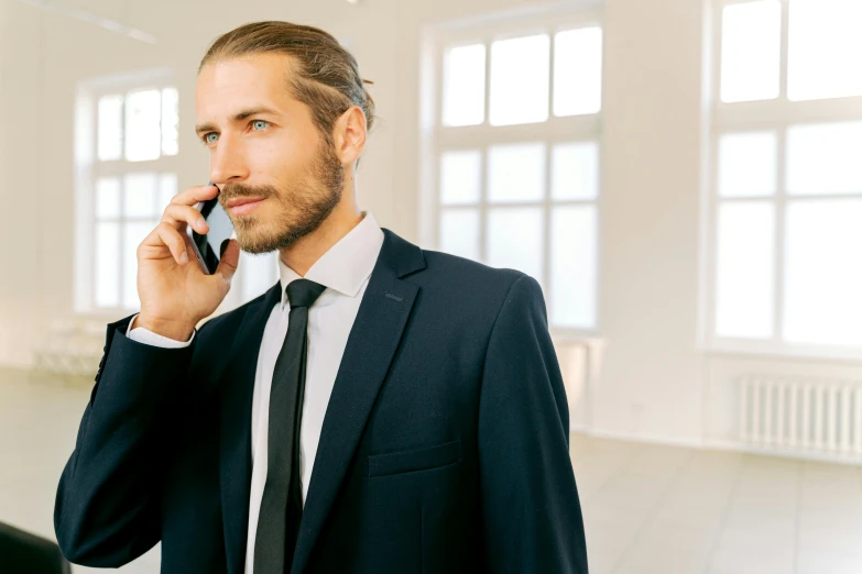 a man in a suit talking on a cell phone, trending on pexels, shia labeouf, office clothes, avatar image, maintenance