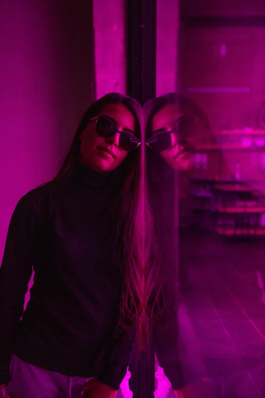 a man and a woman standing next to each other, inspired by Elsa Bleda, unsplash, fuschia leds, with long hair, wearing shades, ((purple))