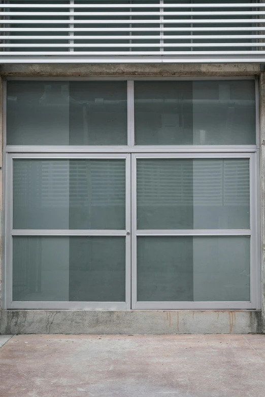 a red fire hydrant sitting in front of a building, by Harvey Quaytman, postminimalism, steel window mullions, grey, 2010s, vintage frame window