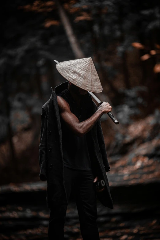 a man standing in the woods holding a baseball bat, inspired by Kanō Hōgai, pexels contest winner, afrofuturism, pointy conical hat, ninja outfit, profile pic, asia