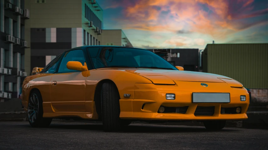 a yellow sports car parked in a parking lot, an airbrush painting, unsplash, retro 9 0 s japanese, orange gradient, portrait shot 8 k, long front end