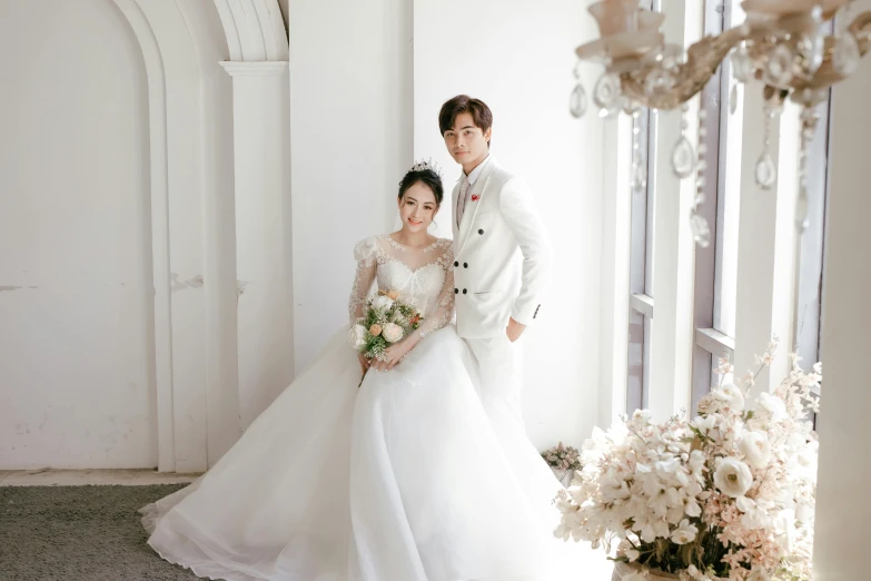 a man and a woman standing next to each other, inspired by Kim Du-ryang, pexels contest winner, romanticism, white regal gown, square, background image, bright daylight indoor photo