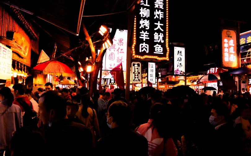 a crowd of people walking down a street at night, pexels, mingei, food stalls, 💋 💄 👠 👗, daoshu, strange and hauntingly beautiful