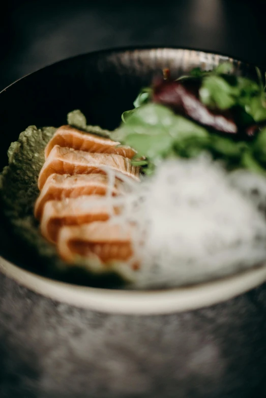 a close up of a bowl of food on a table, inspired by Nishida Shun'ei, unsplash, translucent gills, a pair of ribbed, gourmet style, super detailed image