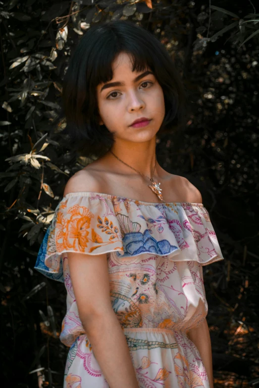 a beautiful young woman standing in front of a bush, trending on pexels, renaissance, off the shoulder shirt, melanie martinez, portrait image, promotional image