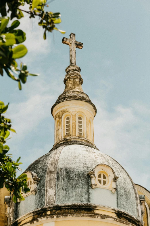 a building with a cross on top of it, trending on unsplash, baroque, dome of wonders, in louisiana, profile image, brazilian