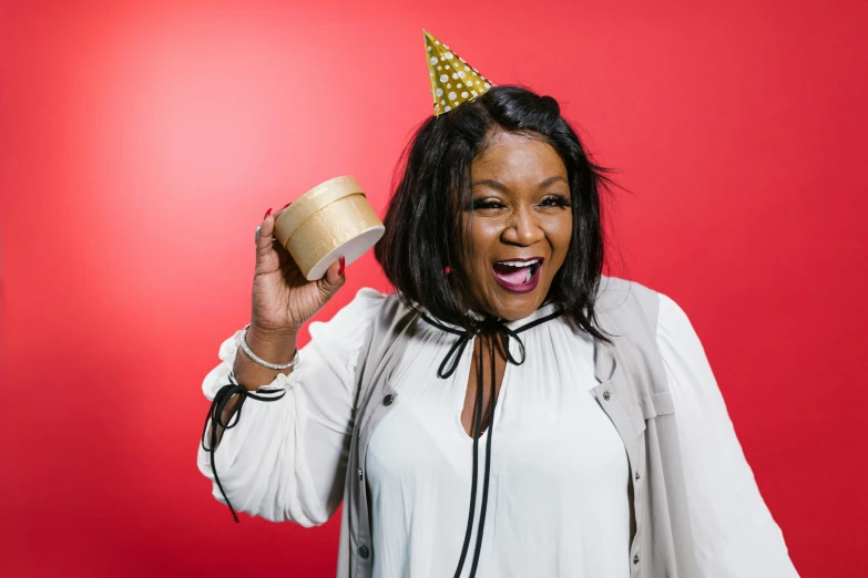 a woman with a crown on top of her head, shutterstock contest winner, happening, ice cream, naomi campbell, celebrating a birthday, lizzo