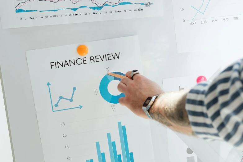 a man pointing to a chart on a white board, pexels contest winner, cover shot, 🚀🌈🤩, fins, orthoview