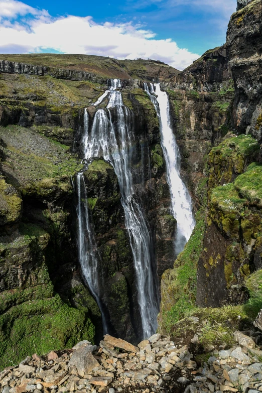 a group of people standing in front of a waterfall, by Hallsteinn Sigurðsson, pexels contest winner, hurufiyya, seen from above, waterfall cascades, lower and upper levels, extreme panoramic