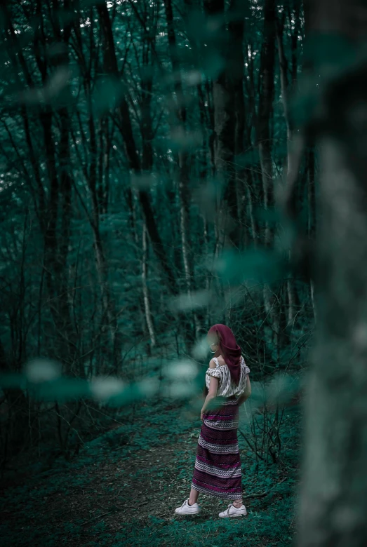 a woman standing in the middle of a forest, inspired by Elsa Bleda, pexels contest winner, renaissance, green and red, pensive lonely, maroon, ((forest))