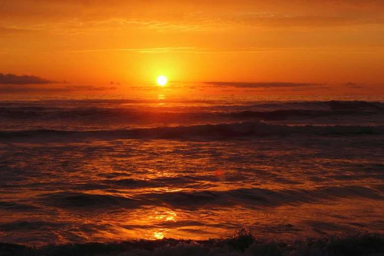 the sun is setting over a body of water, by Heather Hudson, pexels contest winner, romanticism, orange, oceanside, liquid gold, goodnight