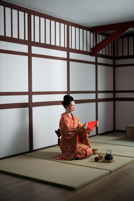 a woman in a kimono sitting on the floor, square, production photo, japan deeper travel exploration, in a dojo