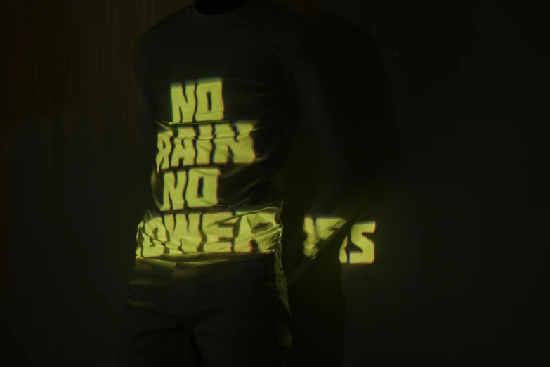 a man that is standing in the dark, an album cover, inspired by Bruce Nauman, pexels, graffiti, long sleeves, hivis, no - text no - logo, no power