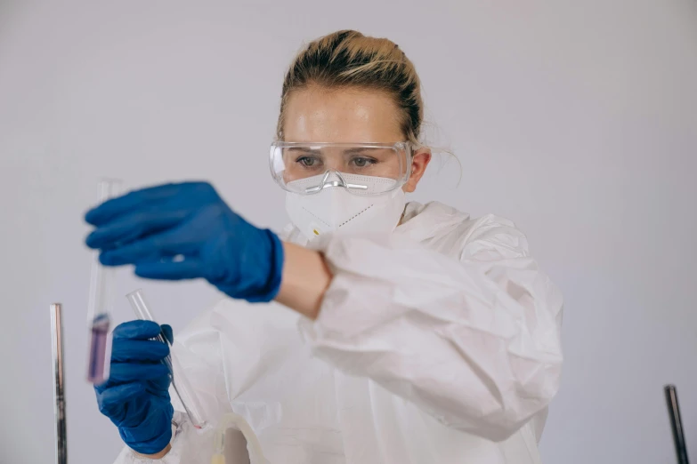a woman in a lab coat holding a test tube, pexels, process art, white elbow gloves, avatar image, gif, maintenance photo