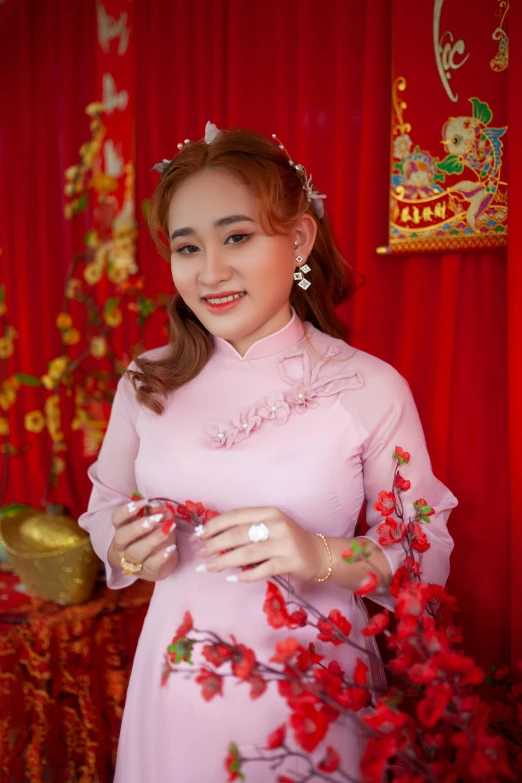 a woman in a pink dress holding a glass of wine, inspired by Cui Bai, happening, wearing authentic attire, wedding, 2019 trending photo, 👰 🏇 ❌ 🍃