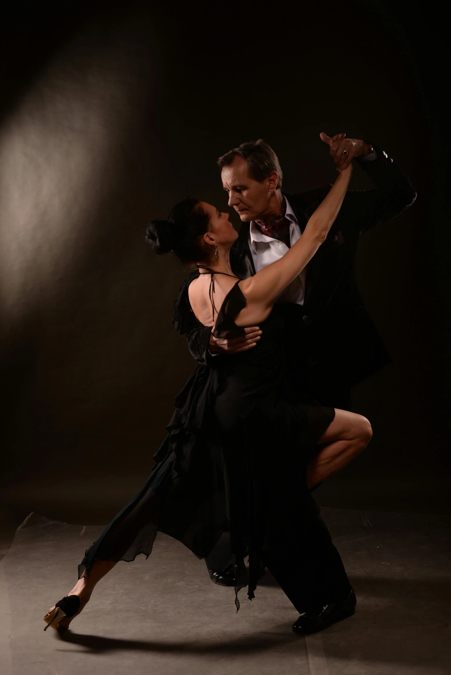 a man and a woman dancing in a dark room, profile image, doing an elegant pose over you, promotional image, thumbnail