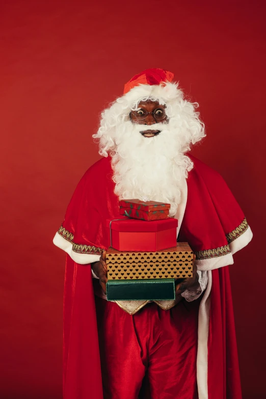 a man dressed as santa claus holding presents, inspired by Geertgen tot Sint Jans, pexels contest winner, afrofuturism, brown skinned, patron saint of 🛸🌈👩🏾, thumbnail, high resolution image