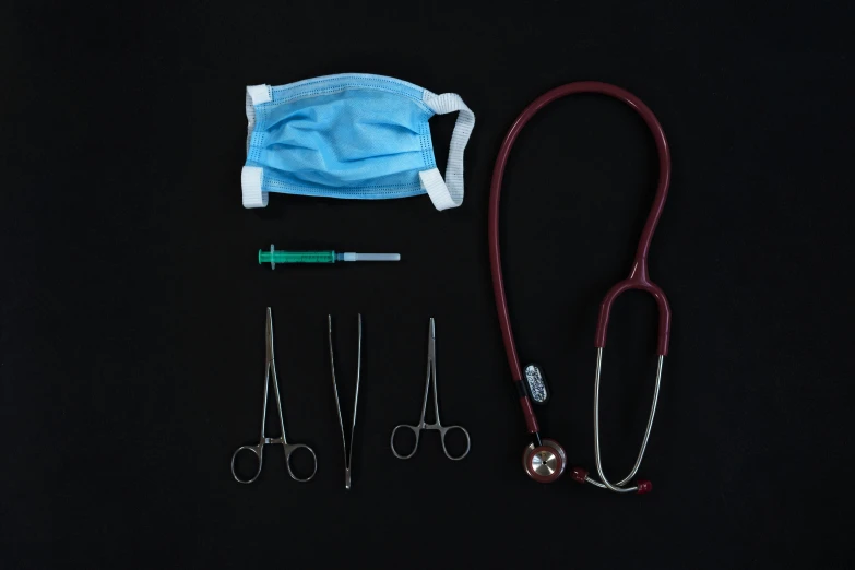 a pair of scissors, a stethoscope, and a mask on a black background, pexels, full body 8k, taken on iphone 14 pro, hospital, kit