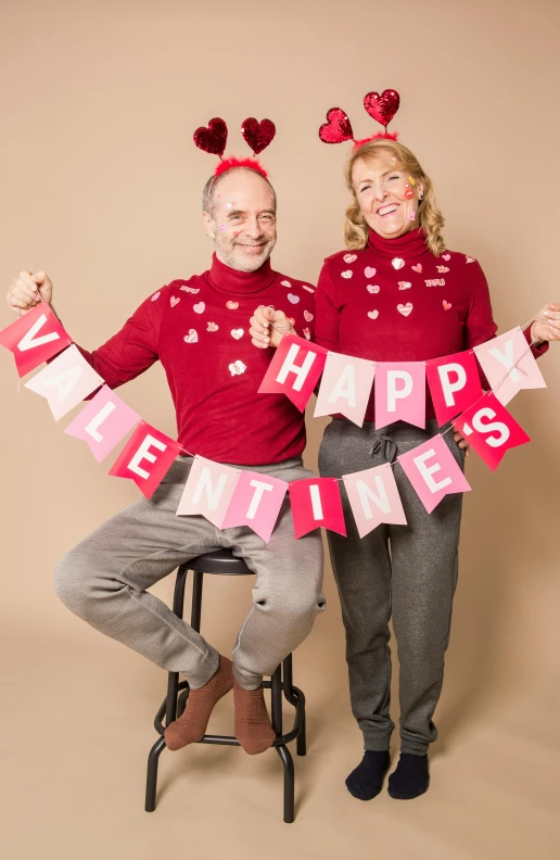 a couple of people that are posing for a picture, by Valentine Hugo, happening, wearing festive clothing, official product photo, ( ( photograph ) ), annie leibowit