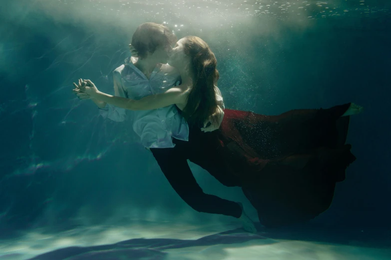 a man and a woman are underwater in a pool, an album cover, unsplash contest winner, renaissance, emma watson as sea mermaid, loving embrace, 15081959 21121991 01012000 4k, movie still 8 k
