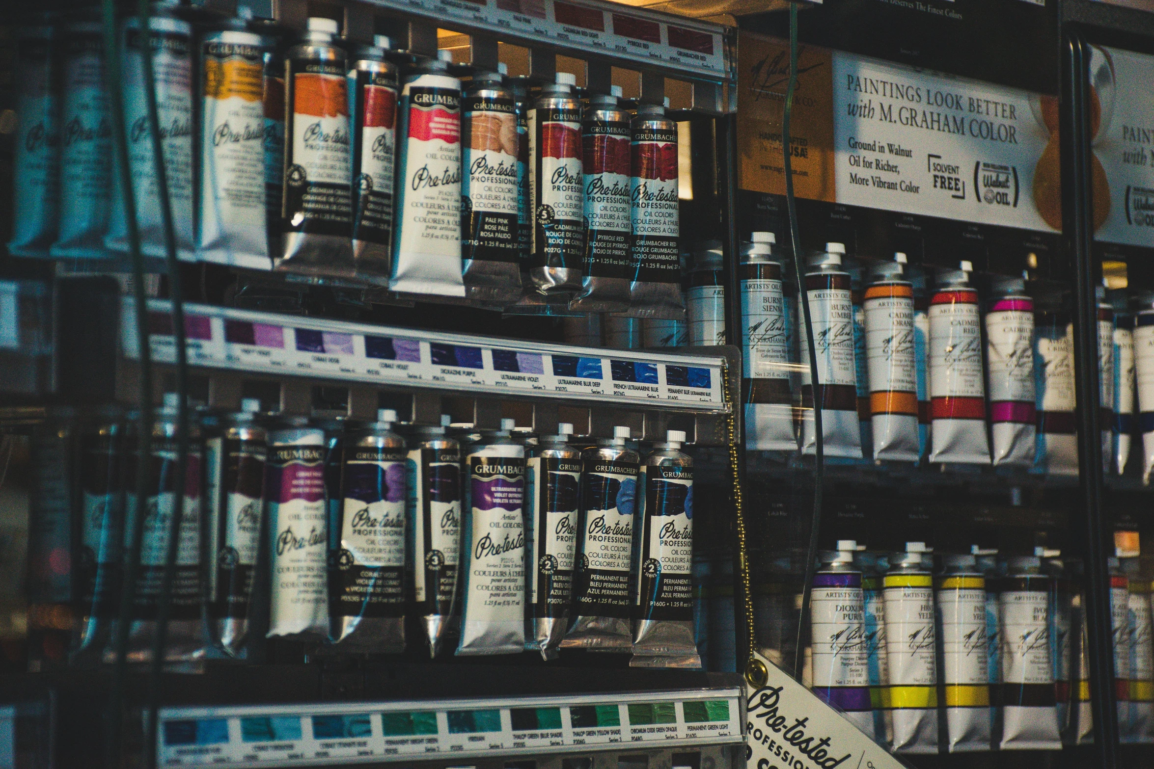 a shelf filled with lots of different types of paint, a photorealistic painting, pexels contest winner, 🎨🖌, sitting on a store shelf, intricate oil details, pathecolor