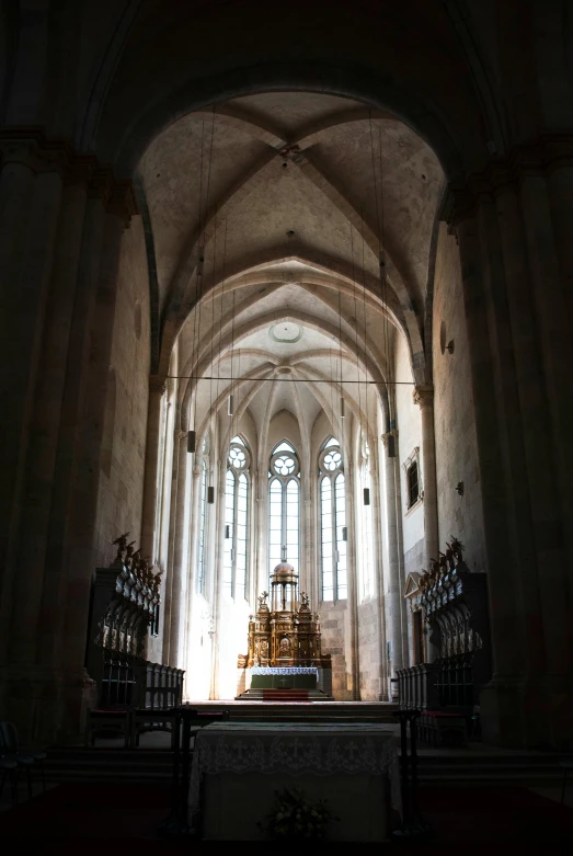 a photo of the inside of a church, inspired by Károly Markó the Elder, strong sunlight, seen from afar, 1 5 th century, ox