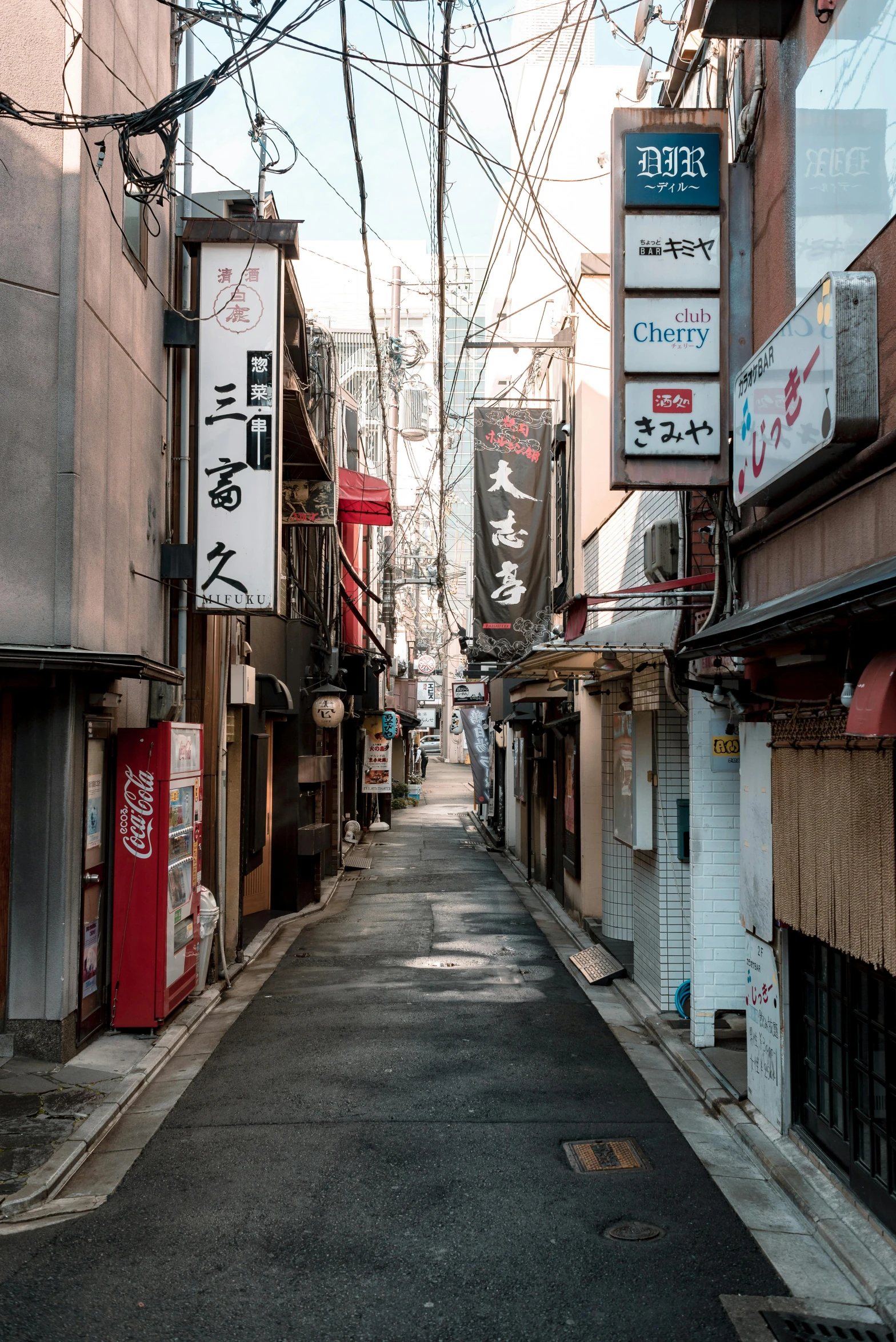 a narrow alley in the middle of a city, inspired by Kanō Hōgai, trending on unsplash, deserted shinjuku junk, fujifilm”, rectangle, ethnicity : japanese