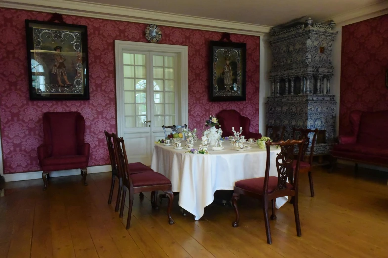 a dining room with a table and chairs, by Alice Mason, rococo, brocade robes, set photo, square, restaurant