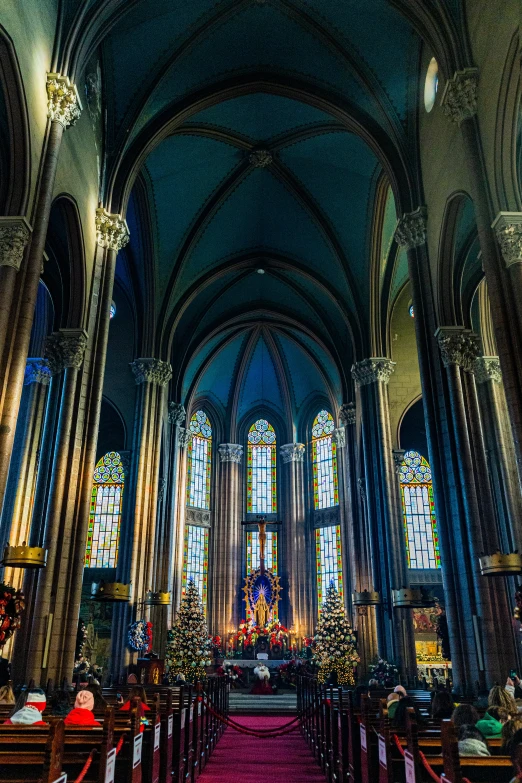 the interior of a church with pews and stained glass windows, a photo, inspired by Barthélemy d'Eyck, 2 5 6 x 2 5 6 pixels, glowing blue interior components, epic castle with tall spires, holiday