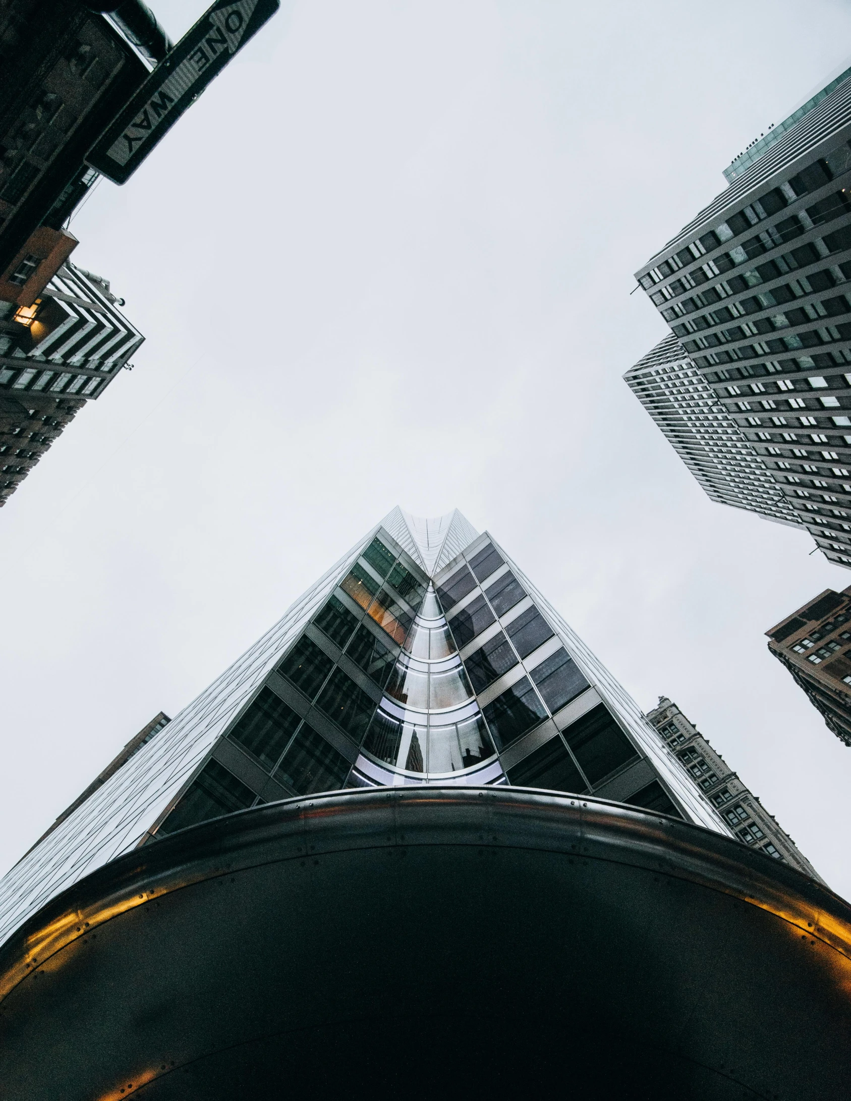 a group of tall buildings in a city, a screenshot, pexels contest winner, crazy angle, ignant, upscale photo, towering