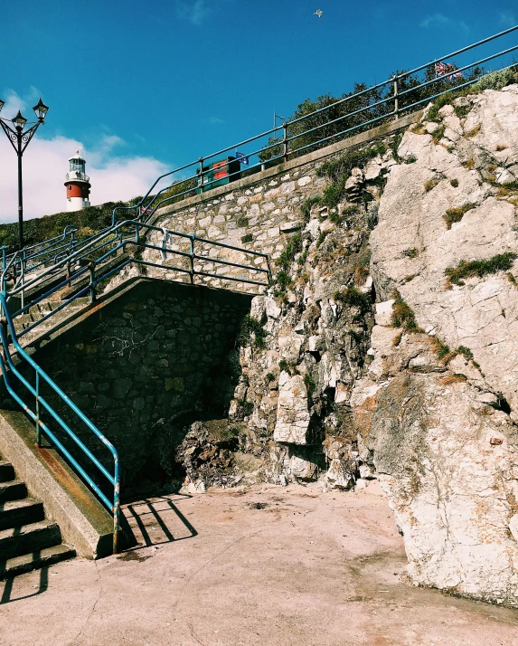 a set of stairs leading up to the top of a mountain, scylla and charybdis, square, colour corrected, thumbnail