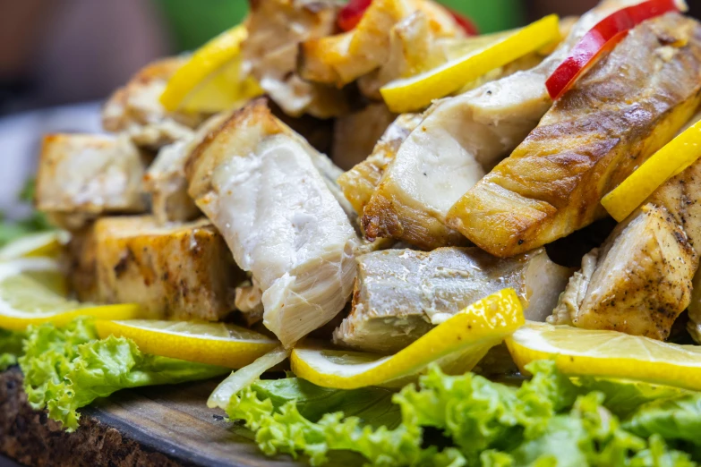 a close up of a plate of food on a table, fish shoal, profile image, barbecue, thumbnail