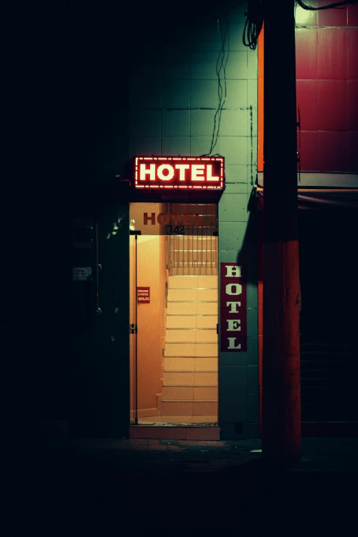 a hotel sign is lit up in the dark, a polaroid photo, inspired by Elsa Bleda, unsplash, postminimalism, doors, lee madgwick & liam wong, a colorful, ilustration