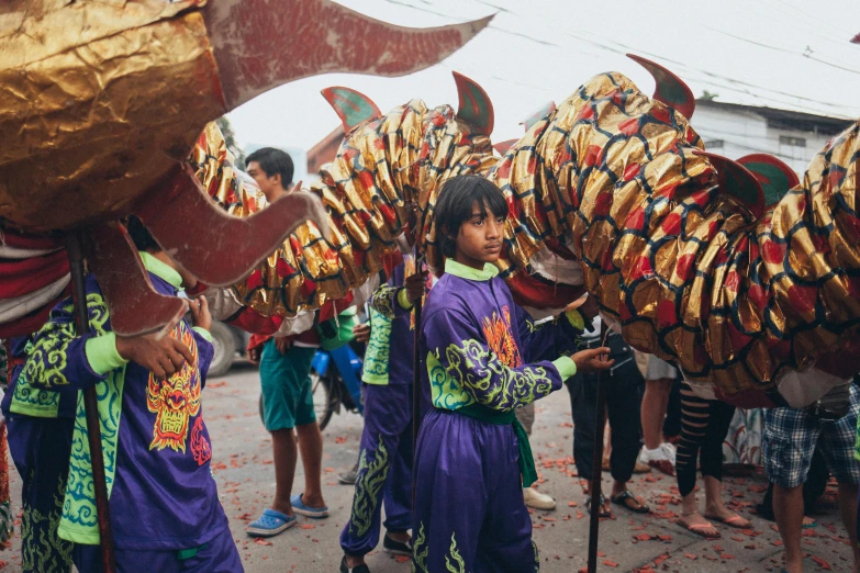 a group of people standing next to each other, by Andrée Ruellan, pexels contest winner, cloisonnism, teenage girl riding a dragon, community celebration, 🦩🪐🐞👩🏻🦳, hoang long ly