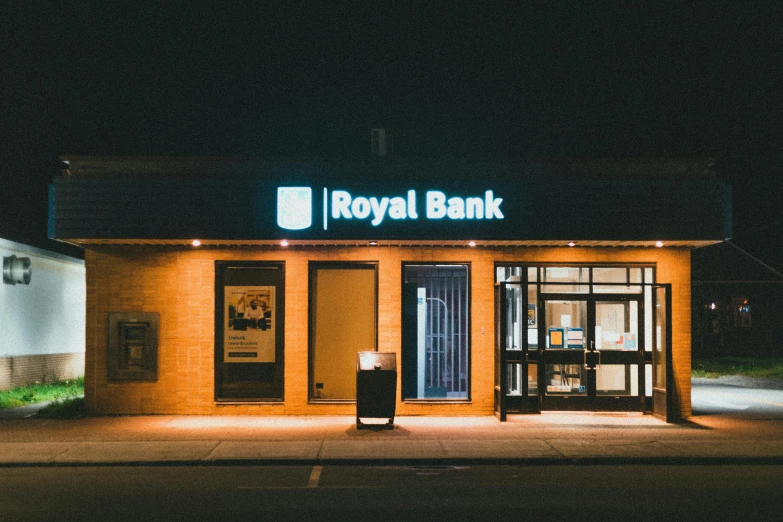 a royal bank building lit up at night, by Rachel Reckitt, unsplash contest winner, hyperrealism, beige and dark atmosphere, 2 5 6 x 2 5 6 pixels, regal fast food joint, wooden banks