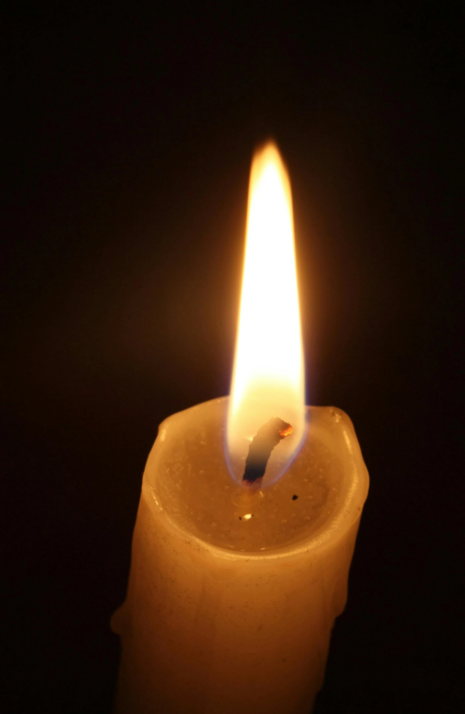 a close up of a lit candle in the dark, birdseye view, profile picture, multiple stories, high-resolution
