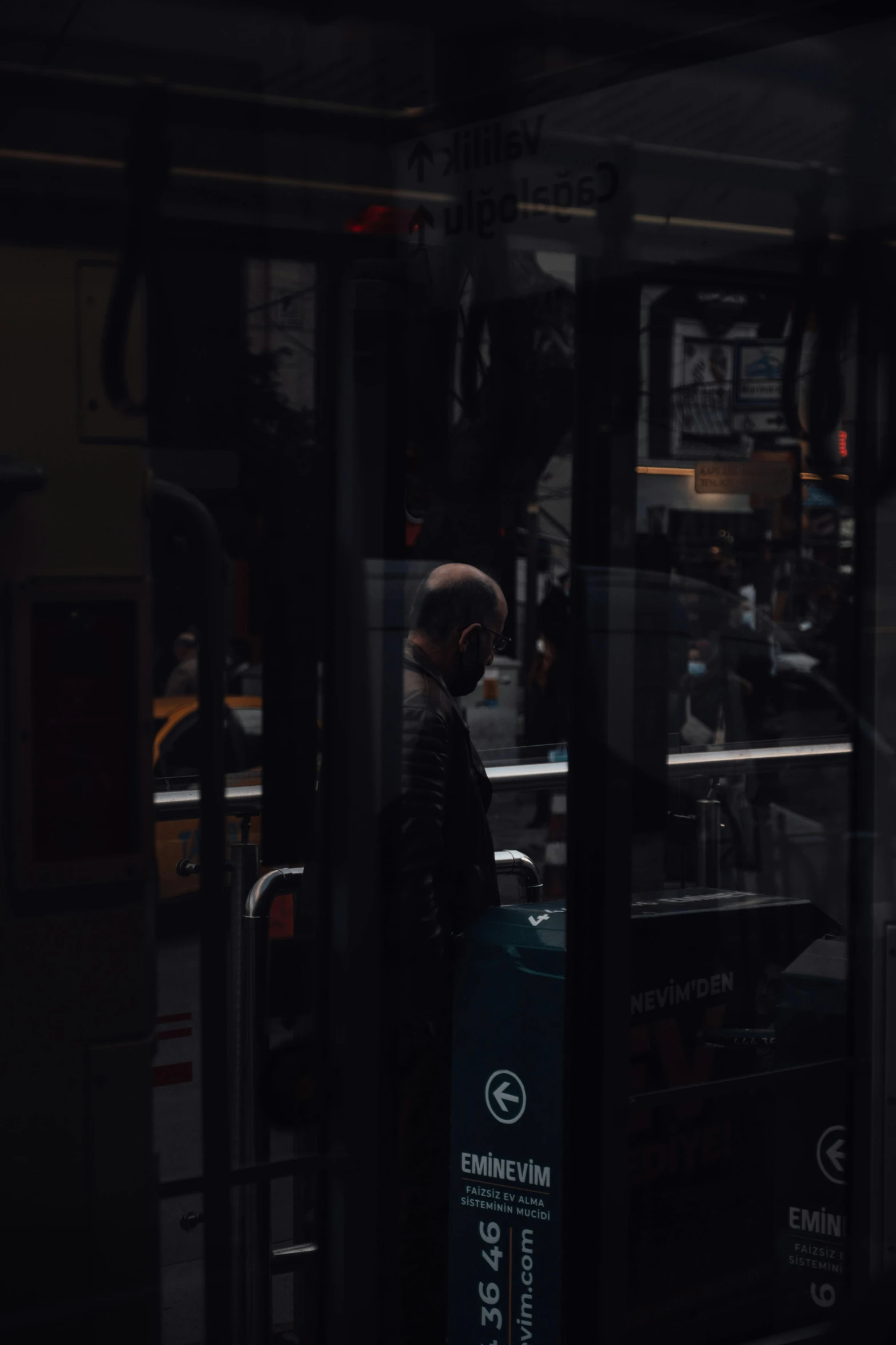 a man that is standing in front of a bus, by Thomas Wijck, pexels contest winner, hyperrealism, mta subway entrance, 2 0 2 1 cinematic 4 k framegrab, the ghost in the machine, very reflective