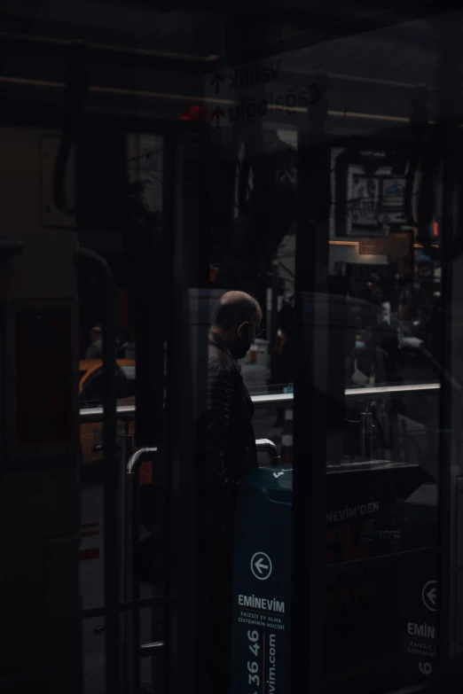 a man that is standing in front of a bus, by Thomas Wijck, pexels contest winner, hyperrealism, mta subway entrance, 2 0 2 1 cinematic 4 k framegrab, the ghost in the machine, very reflective