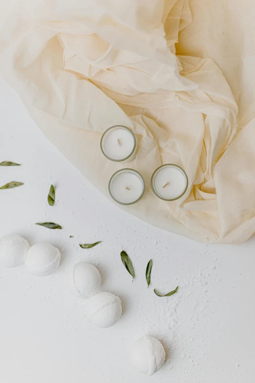 a bunch of candles sitting on top of a white table, detailed product image, hatching, detail shot, sage