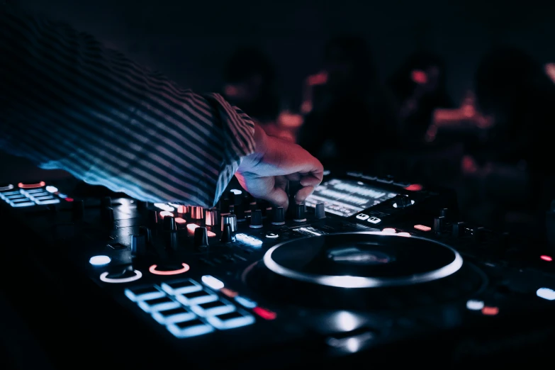 a close up of a person using a dj controller, trending on pexels, night life, avatar image, instagram post, vibration