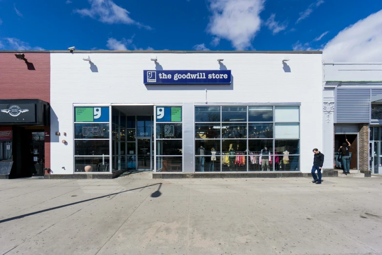 a storefront with people walking in front of it, the good, exterior photo, rockwell, full daylight