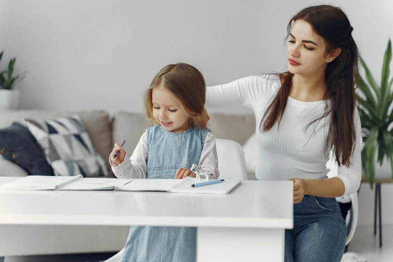 a woman sitting at a table with a little girl, expert shading, neat and tidy, pokimane, student