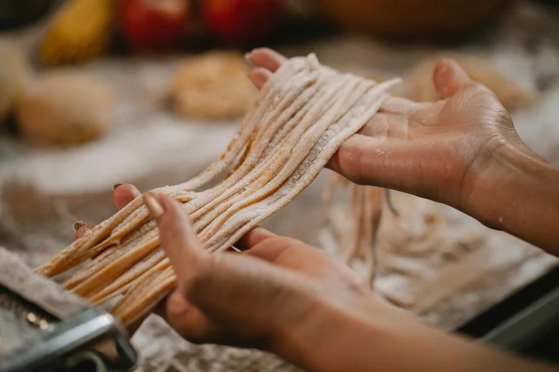 a person that is making some kind of food, pexels contest winner, stringy, striped, italian renaissance workshop, up close