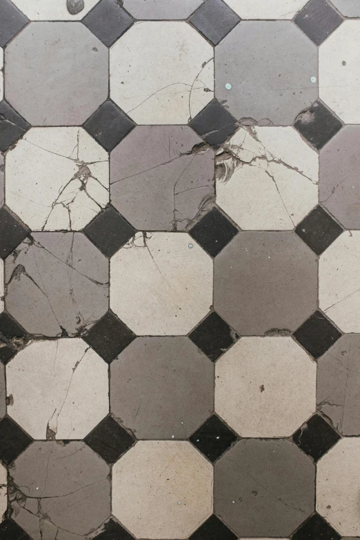 a black and white tiled floor in a bathroom, an album cover, by Jacob Toorenvliet, unsplash, baroque, 1 8 8 0 s, damage, ( geometric ), detailed color scan