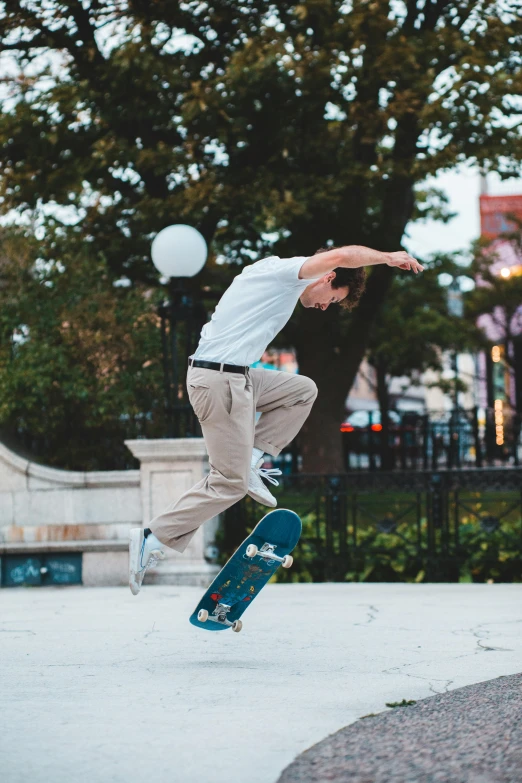 a man flying through the air while riding a skateboard, unsplash contest winner, realism, launching a straight ball, low quality photo, concerned, late evening