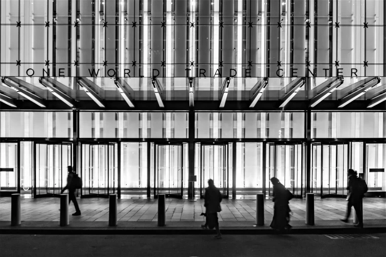 a group of people standing in front of a building, modern new york, award winning image, walk, wonderful lighting