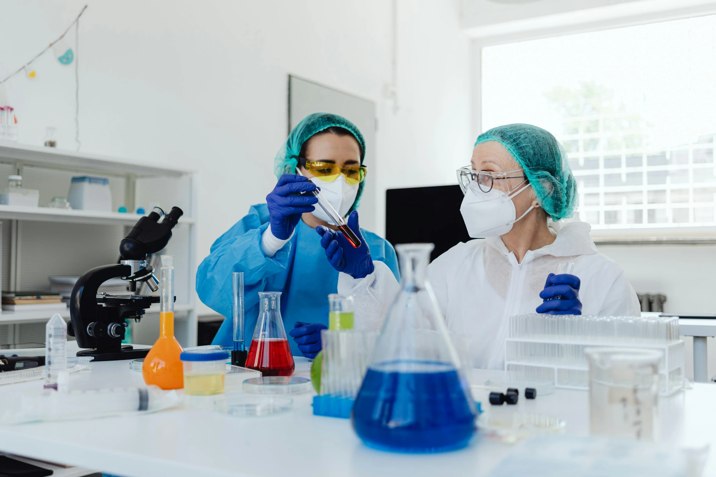 a couple of people that are in a lab, trending on pexels, sterile colours, thumbnail