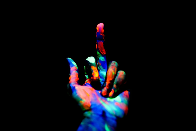 a person holding their hand up in the dark, by Adam Chmielowski, holography, colorful paint, giving the middle finger, colorful high contrast hd, album