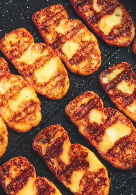 a pan filled with lots of food sitting on top of a stove, inspired by Pia Fries, reddit, toasted bread in toaster slots, thumbnail, full frame image, made of cheese